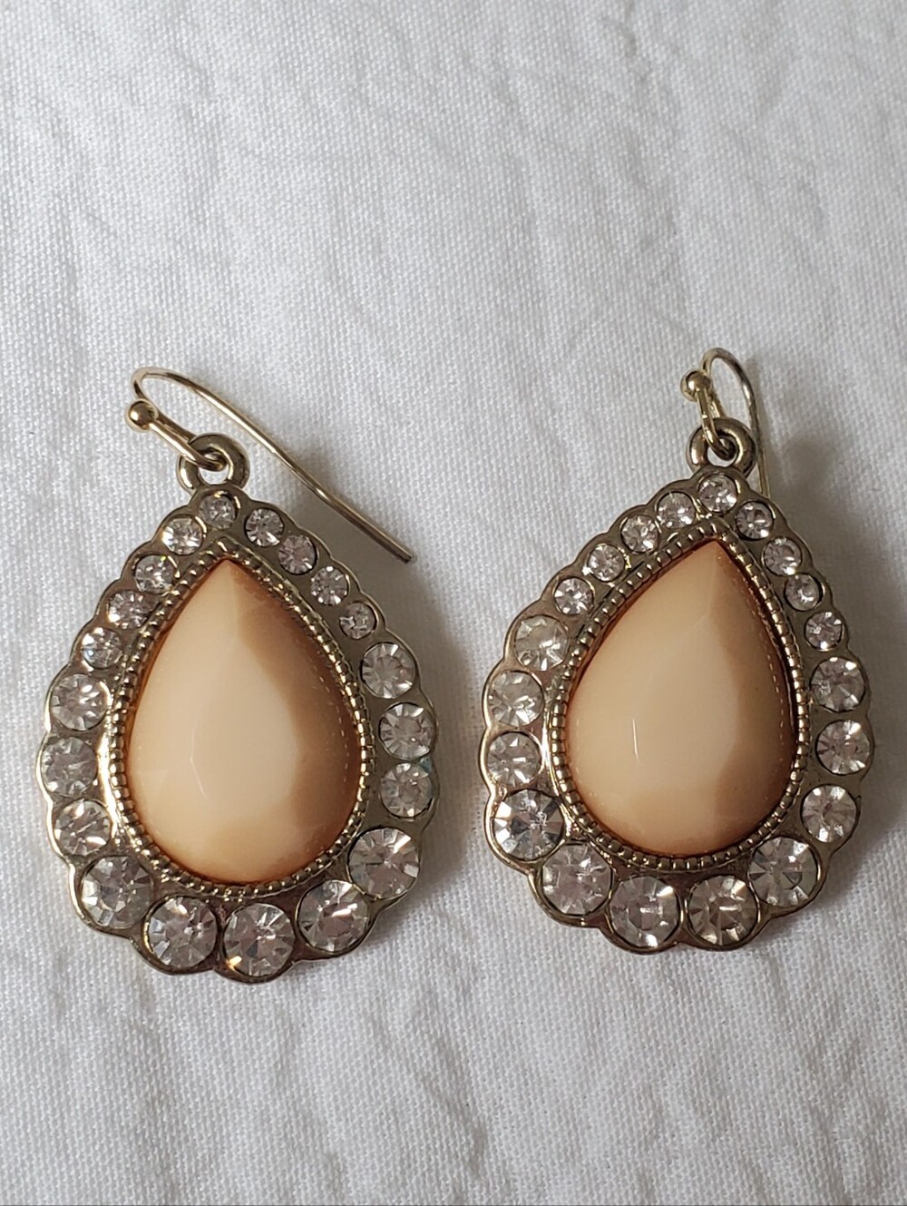 Peach Coloured Teardrop Crystal Drop Earrings in Gold Tone